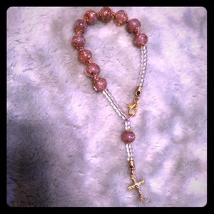 Beaded cross bracelet from Murano, Italy.
